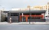 The 404 is a new boutique hotel and restaurant in Nashville’s rapidly changing Gulch neighborhood. Housed in a former auto shop next to the legendary Station Inn music venue, the small space stands in stark contrast to the new, large developments that have recently sprung up. The restaurant in front is partially housed in a shipping container that both extends the entry up to the sidewalk and acts as a visual focal point on an otherwise subdued exterior. Photo by Caroline Allison. Photo of 20 Ideas On What You Can Do With Old Shipping Containers modern home