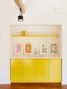 Modern home with Kitchen, Track Lighting, Colorful Cabinet, Medium Hardwood Floor, and Undermount Sink. In the office, existing track lighting illuminates cabinetry covered in Lemon Bar by Miller Paint. Photo of 40+ Yellow Modern Home Design Ideas