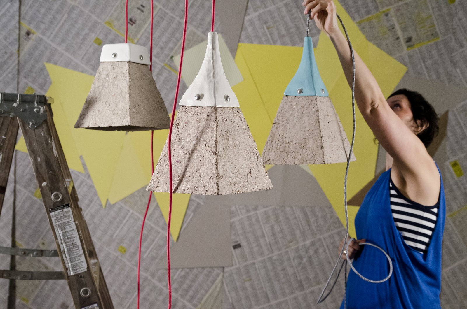 Jasna Sokolovic and Pulpites Lamps

A play in texture and contrast, the Pulpites lamps contain a mixture of cardboard, and in some cases, even old letters and egg cartons, with a fabric cord and ceramic cap made from scratch.

Photo courtesy of Dear Human.