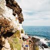 With little beach to speak of, sunbathing is confined to a craggy bit of rock just above the water at this house near the town of Las Caletillas.
Don't miss a word of Dwell! Download our FREE app from iTunes, friend us on Facebook, or follow us on Twitter! Photo of Surf Shacks modern home