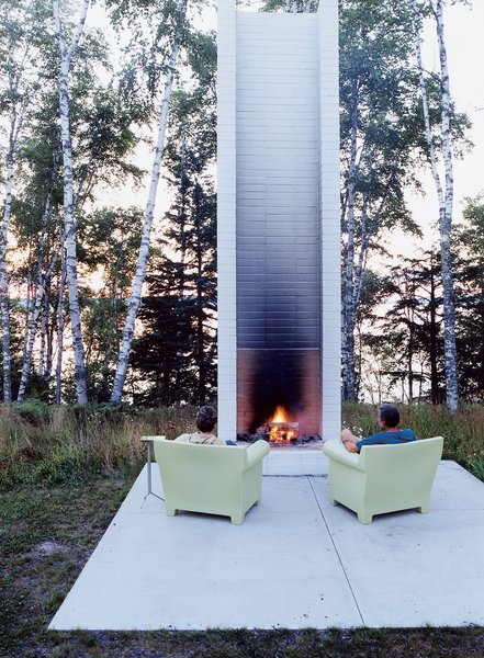 Philippe Starck’s outdoor chairs for Kartell provide cozy fireside seating. These and the sofa version were selected by Salmela. 