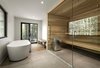 Modern home with Bath Room, Freestanding Tub, and Concrete Floor. A sauna is an optional feature. Cedar and concrete create a recurring visual theme from the exterior to the interior. Photo 4 of Spahaus