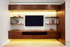 Fraher and Co designed the shelving to lighten in tone as one ascends through the house. It moves from black walnut to lighter oak to wood that's painted white. Photo 7 of Lantern Home modern home
