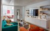 Warm white oak flooring is used in the kids’ media room, a place for casual lounging. It is here that Kopel’s favorite architectural detail can be found: the full-height light slot between the lounge and the entrance vestibule to the apartment. Photo of A Bright Brooklyn Loft with an Envy-Inducing Walk-In Closet modern home
