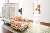 Layer by layer, this crumbling 18th-century flat in the middle of Barcelona found new life at the hands of architect Benedetta Tagliabue. Paths of Andalusian tile and intervening plaster walls help to delineate space in the expansive apartment, which is centered around an internal entry courtyard. The armchair, designed by Peter and Alison Smithson, is covered in a Josef Frank textile from Just Scandinavian. The white piece just behind it is a repurposed Austrian stove that’s now used as a storage device. Photo of Strange Salvaged Materials and Objects in Modern Homes modern home