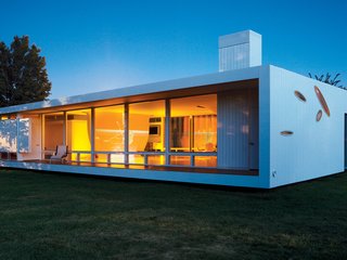 This highly personalized prefab home has already been on the move: designed by architect William Massie, the home was built in sections that were then transported to its current site on a lawn outside of an art museum, where it awaits its new owner. Its all-white exterior and steel frame make it modern, but its uniquely shaped windows give it a one-of-a-kind look that make it perfect for use as a guesthouse.