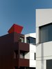 Modern home with Exterior and Green Roof Material. The roof-mounted EcoHat conceals solar panels and gives a unique look to the property. Photo of 16 Funky Facades