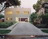 Architects Dawn Finley and Mark Wamble's 1,200-square-foot house in Houston, Texas, is clad in corrugated metal and contains their five-person firm, Interloop—Architecture. Photo of Steel Yourself modern home