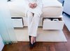 Storage beneath the bed obviates the need for a dresser and allows for a narrow pass between bed frame and sliding partition. Photo of Designing for Privacy: 14 Discreet Uses For Frosted Glass modern home