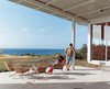Modern home with Outdoor, Large Patio, Porch, Deck, and Concrete Patio, Porch, Deck. Architect Craig Steely designed this house for himself, his wife Cathy Liu, a painter, and their son, Zane, that looks out to the Pacific Ocean from a lava flow on the big island of Hawaii. Photo of Stunning Waterfront Structures
