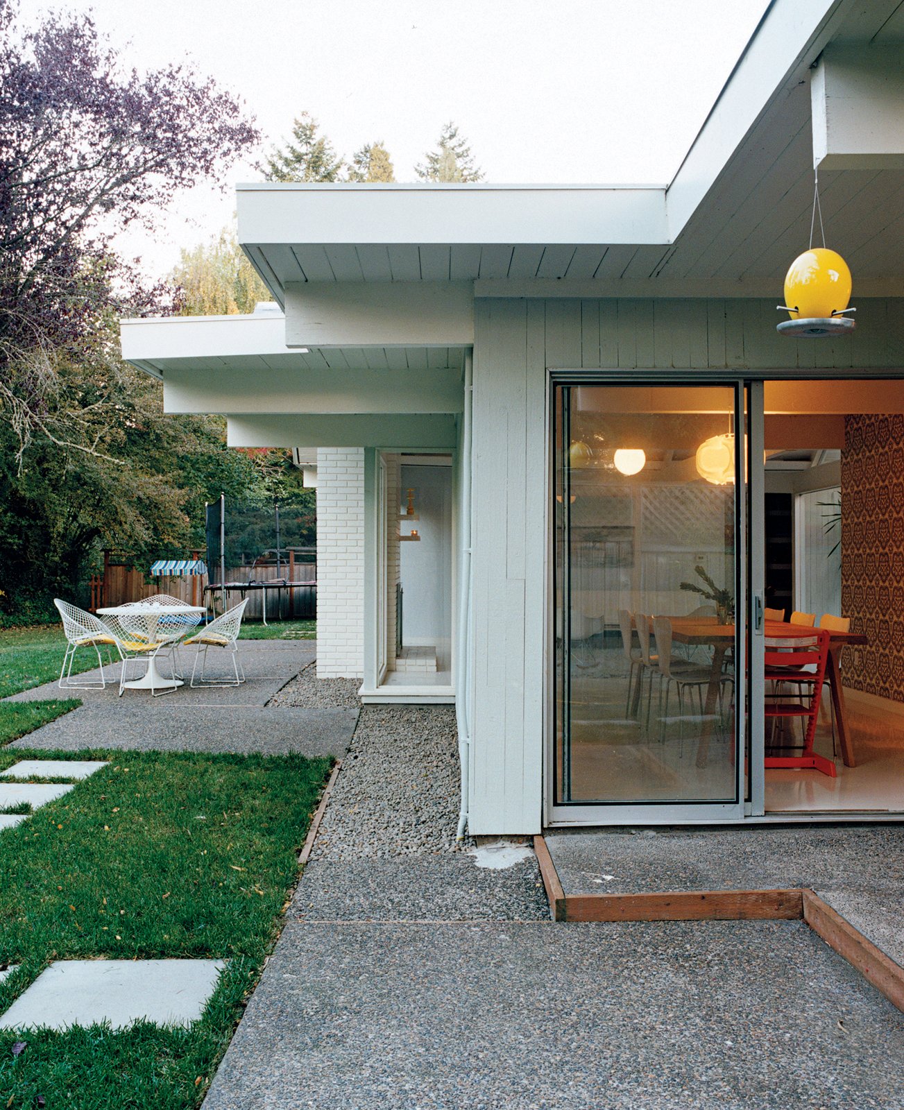 A Dokstra table from Ikea is situated on the patio.