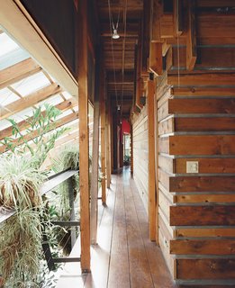 The floorboards are lumberyard "culls" that had turned gray or cracked from being exposed to weather. Meffan had them re-milled into pristine planks with an old-world feel. Contractors typically pass up culls to get to the "good" wood below. Ask at your local home center, and you may be able to get them at a steep discount, or even for free.
