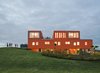 Modern home with Exterior and House. Villa Van Vijven cuts a truly remarkable figure, a striking orange figure on the otherwise flat green landscape. Photo of 16 Funky Facades