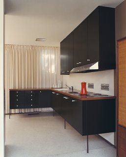 If your kitchen is quite simple and lacking personality, new door knobs in an interesting color, finish, or shape offer a great way to imbue some personality without undergoing a drastic transformation. These George Nelson cabinet pulls were made with a CNC router based on an original.