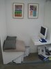 Once you pass the kitchen area the circulation curves around back toward the living room space. Along the way there's this little computer nook. Photo of Maggie's Center by Zaha Hadid modern home