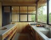 Modern home with Kitchen. The kitchen is simple, functionally serving the needs of a family of four seeking to escape from New York’s Greenwich Village for days and weeks during the summer. Courtesy Architects and Artisans. Photo 8 of Shelter Island Retreat