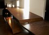 Cormier designed a movable parquet ramp that leads to the sleeping loft and masks his kitchen. Photo of Canada's Design Domestic modern home
