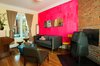 Some of the furniture in MacIsaac's home--like the olive-green Klauser and Carpenter easy chair in the foreground--can be purchased at Ministry of the Interior. Photo of Canada's Design Domestic modern home