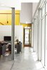 Modern home with Living Room and Concrete Floor. Moreland House Photo of 40+ Yellow Modern Home Design Ideas