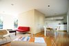 Modern home with Living Room, Chair, Medium Hardwood Floor, and Sofa. The first floor of the house used to be a warren of five tiny rooms, and the first thing you saw when you walked in the front door was the attic staircase. Waechter opened the space up into one large, light-filled room. A birch plywood-sheathed box was designed to look like an oversized piece of furniture, mimicking the light wood of the Eames chair and Case Study Daybed, while cleverly hiding the stairs, storage, and powder room inside. Photo: Atelier Waechter.
The first floor of the house used to be a warren of five tiny rooms, and the first thing you saw when you walked in the front door was the attic staircase. Waechter opened the space up into one large, light-filled room. A birch plywood-sheathed box was designed to look like an oversized piece of furniture, mimicking the light wood of the and Case Study Daybed, while cleverly hiding the stairs, storage, and powder room inside. Photo: Atelier Waechter. Photo 2 of Portland's Cape Cod Remodel