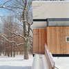 Modern home with Exterior, Cabin Building Type, Butterfly RoofLine, and Wood Siding Material. A simple walkway leads to the unassuming entrance. "It's obscured, detailed like the cedar walls," Poss says. Photo by Phillip Kalantzis-Cope. Photo of Butterfly Roof Meditation Hut