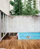 Modern home with Outdoor. The small pool at the top of the landing provides the family with a place to cool off. Photo of 30+ Best Modern Fences