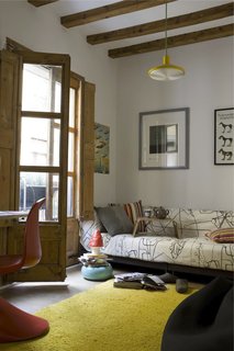 Rather than throwing away and replacing the existing French doors, paint was removed from the doors and their corresponding interior shutters by sandblasting.