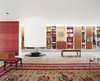 In the winter, the cylindrical fireplace in the central living area was always ready for a fire. In spring and summer, the base was filled with plants. Photo 6 of Miller House in Columbus, Indiana by Eero Saarinen modern home