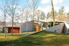 Modern home with Exterior, Concrete Siding Material, and House Building Type. “The house is a piece of origami made out of triangular shapes, which we then draped over the landscape,” says Arbel. Photo 3 of 23.2 House