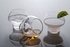 Jørn Utzon was most famous for designing the Sydney Opera House but also created a number of product designs. Architectmade discovered the 1949 drawings for these glasses, named Spring, in museum archives in Denmark. The glasses are stackable and can also be tipped on their side for cognac. When one drinks from them, the experience is meant to replicate that of drinking from a spring, hence the name. Photo of Architectmade modern home