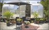 An exterior view of the finished trailer, installed on site in Big Sur. It's available for nightly rentals. Photo of Big Sur Airstream Renovation modern home