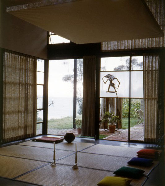 Another shot from 1950 shows more goza mats and pillows for seating guests. The ocean can be seen beyond the corner window; it is now more obscured by trees. Photo courtesy the Eames Foundation.