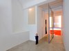 The home's different levels create a playful experience for the inhabitants. The concrete floor references the building’s past use as a garage for ambulances. Photo 3 of Parksite Residence, Rotterdam modern home