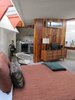 Modern home with Bedroom, Storage, and Bed. This is Unit 4, the only one with a redwood dividing wall between the kitchen and the living room (the rest have open concrete islands). Photo of A John Lautner-Designed Hotel