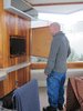 In Unit 3, the first room to be renovated, Trowbridge demonstrates a James Bond-esque element: a hidden television secreted behind a hinged framed painting. Photo of A John Lautner-Designed Hotel modern home
