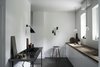 In Jonas Bjerre-Poulsen's home (you might recognize Bjerre-Poulsen as the photographer of this Danish house, which was featured in Dwell's April 2012 issue), white walls and cabinets allow details, like the herringbone worksurface crafted from reclaimed wood and lighting fixtures, to shine. Photo of Monochromatic Color Palettes Are the Ultimate Modern Design Tool modern home