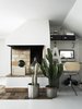 Modern home with Living Room and Standard Layout Fireplace. Blogger and stylist Annaleena Leino Karlsson has designed her 1950s farmhouse to have a mostly white interior. Her workspace is next to a rustic brick fireplace, which is adorned with cacti and decorative objects. Photo of Monochromatic Color Palettes Are the Ultimate Modern Design Tool
