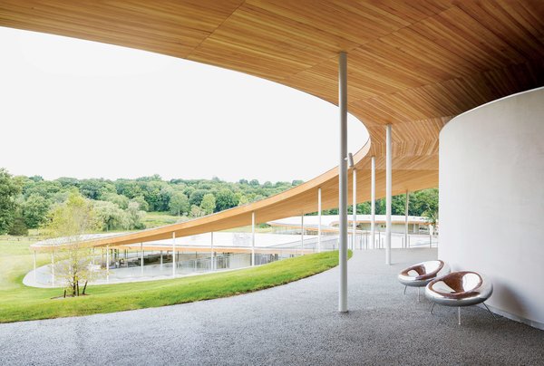 SANAA worked with landscape architecture firm OLIN to ensure that the structure, located on an 80-acre property that includes 16 acres of native wetlands, would respond well to the surrounding landscape. A Douglas fir canopy runs the length of the building.