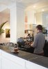 Grab a cup of coffee from Bolt, located next to the seating area. Photo 5 of The Dean Hotel in Providence modern home