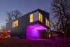 On a wooded plot in Arkansas, the architecture firm Silo AR+D erected a radiant live-work home that announces its nocturnal presence by projecting colored light from concealed LED fixtures. The home's tone can be manipulated and controlled via smartphone. Photo of This Illuminated Arkansas Home Changes Colors with the Tap of a Smartphone modern home