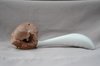 The curved handle straightens your wrist and forces you to push the scoop with your palm, which uses your chest and arm muscles rather than your wrist, making scooping easier. Photo of The World's First Ergonomic Ice Cream Scoop? modern home
