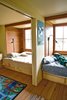 Modern home with Bedroom, Bed, and Medium Hardwood Floor. Now UC It
In the kids’ rooms, the couple has made fine use of UC Santa Cruz dorm furniture—beds, armoires, and desks have gotten a second life off-campus, and Tershy and Zavaleta report that after enduring years of freshmen, the pieces ably stand up to their kids. Outside the upstairs office, an old couch holds court on a small balcony with great views to the south. Photo of Our Favorite Bedrooms