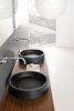Modern home with Bath Room, Wood Counter, and Vessel Sink. Detail shot of the Inkstone wash-basins in Black Rock stone. Photo of Inky Inspiration