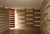 Here's the finished structure. Transparent or translucent acrylic, and wooden strips fill the voids between the blocks, filtering light throughout the house. Photo of Building the Pentimento House modern home