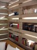 The versatile structure becomes shelf for books, ephemera, and whatever else needs to be stowed away. To see the complete house, pick up our December/January 2013 Prefab Comes Home issue on newsstands November 27. Photo of Building the Pentimento House modern home