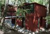 Shipping containers are the building blocks of this residence tucked away in the redwood forests of Santa Cruz, California. Photo of 20 Ideas On What You Can Do With Old Shipping Containers modern home