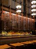 "The ground floor of Momotaro channels the spirit of a Tokyo office space of the 1950’s and 60s," explains AvroKO partner William Harris, "where the salaryman spent his days, with an izakaya on the lower level that's inspired by yokocho: the back alleys that sprang up in Tokyo as post-war black markets." Photo of Hospitality Favorites modern home