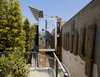 Modern home with Exterior and House Building Type. The compact 712-square-foot cottage sits on top of a 430-square-foot workshop, where Baker’s firm prototypes and produces custom furnishings for his practice. “Not only is there room for more density on most residential blocks in San Francisco, but, if thoughtfully conceived, it also enriches our communities and makes our cities more resilient,” Baker says. Photo of This Net-Zero Residence Might Be the Greenest Home in San Francisco