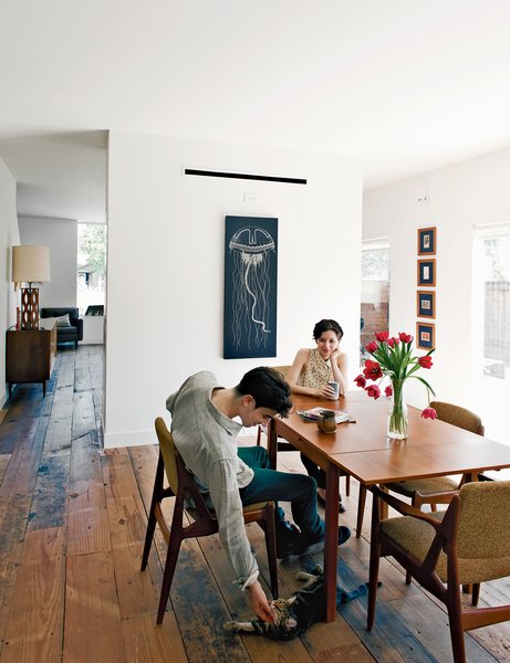 dining room with wooden flooring and vintage furniture