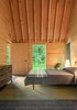 Modern home with Bedroom and Bed. Soranno and Cook used energy-efficient construction and modern mechanical systems in the designs and furnished the interior with pieces from Blu Dot and Knoll. Photo of Tiny Cabins in the Vermont Woods Commune With Nature